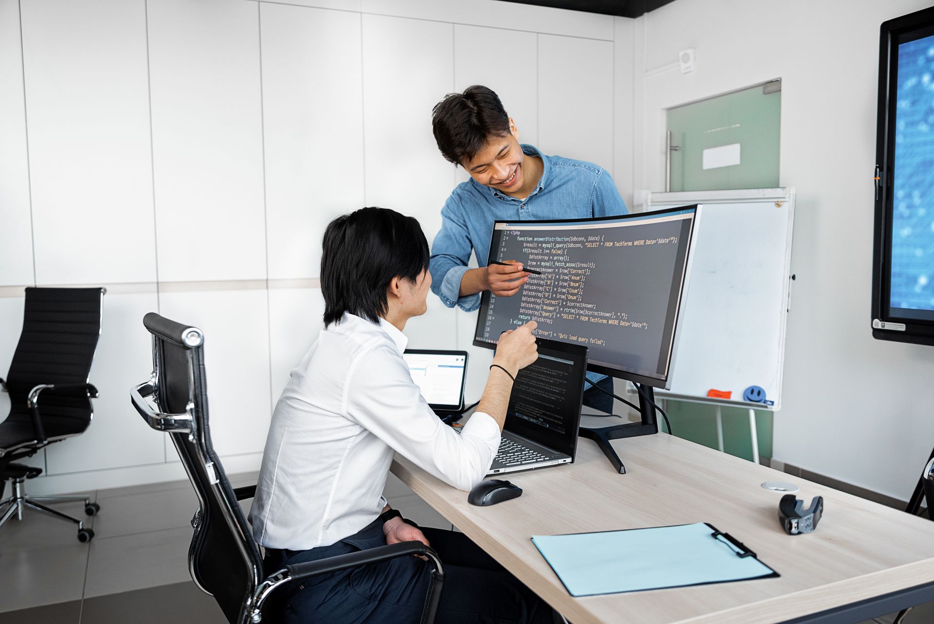 AI engineering team collaborating on neural network dashboards